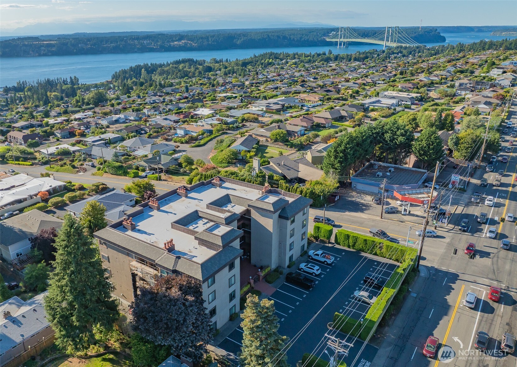 1902 Bridgeport Way West, Unit 106 University Place, WA 98466 - Photo 24 of 25 an aerial view of a house with a garden