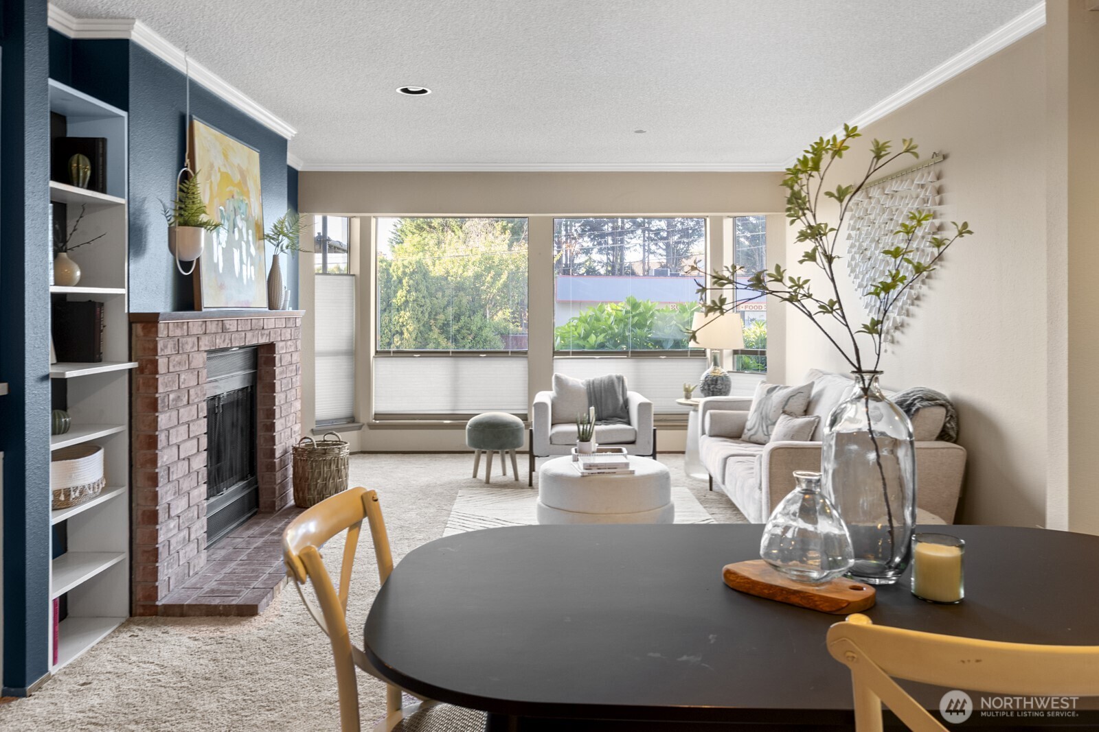 1902 Bridgeport Way West, Unit 106 University Place, WA 98466 - Photo 7 of 25 a view of a dining room with furniture window and outside view