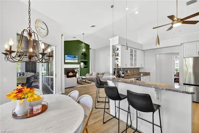 a kitchen with a sink and stove
