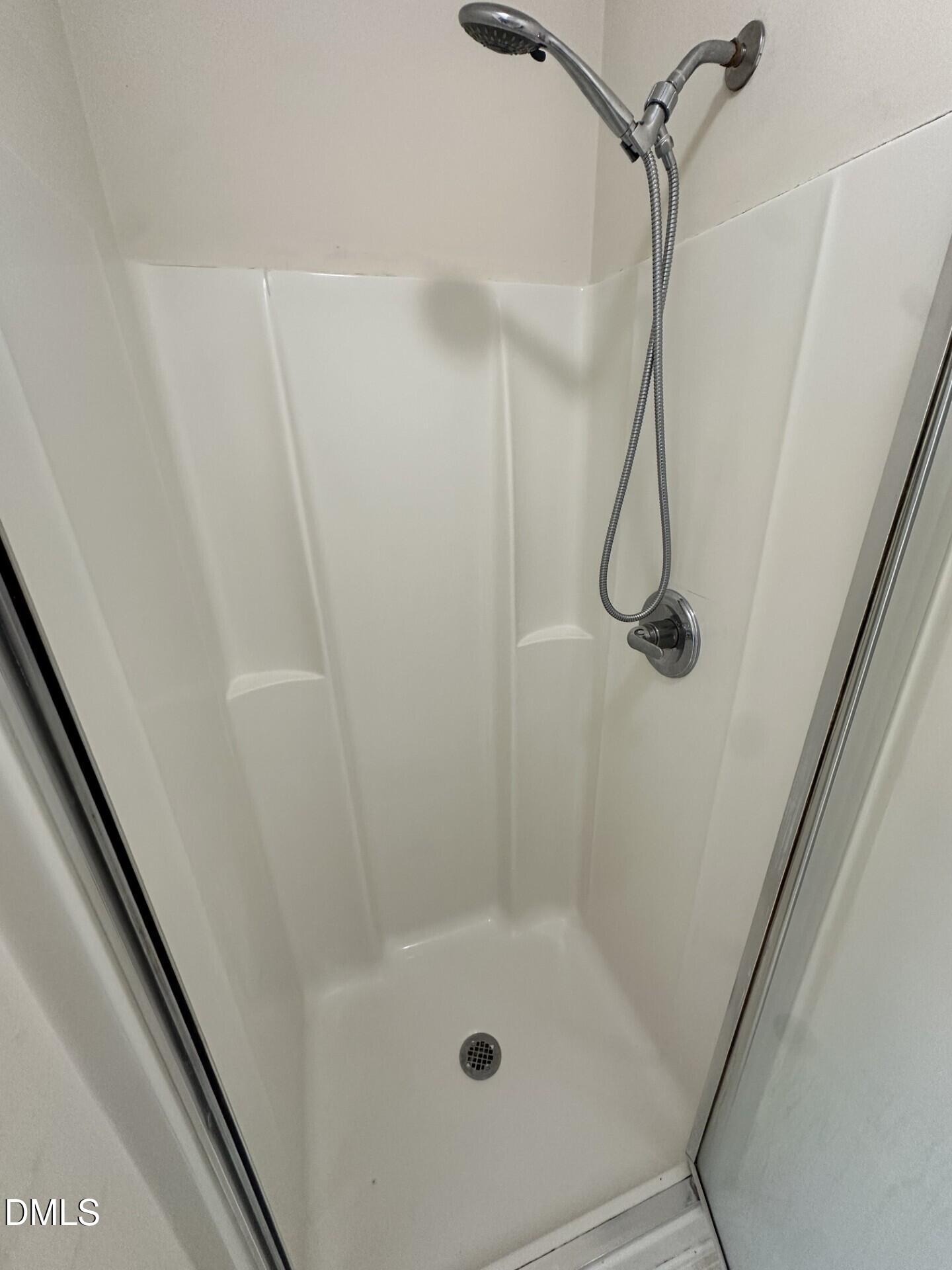 2241 Spruce Shadows Lane Raleigh, NC 27614 - Photo 14 of 18 a bathroom with a shower