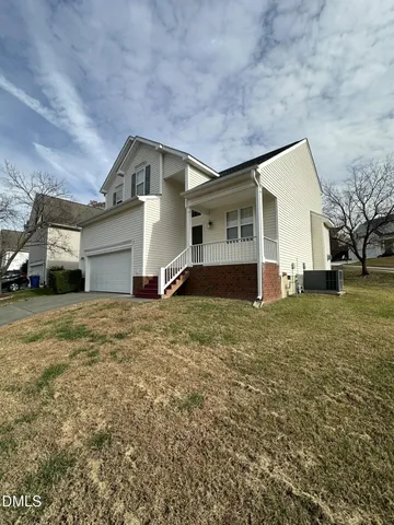 a house view with a backyard space