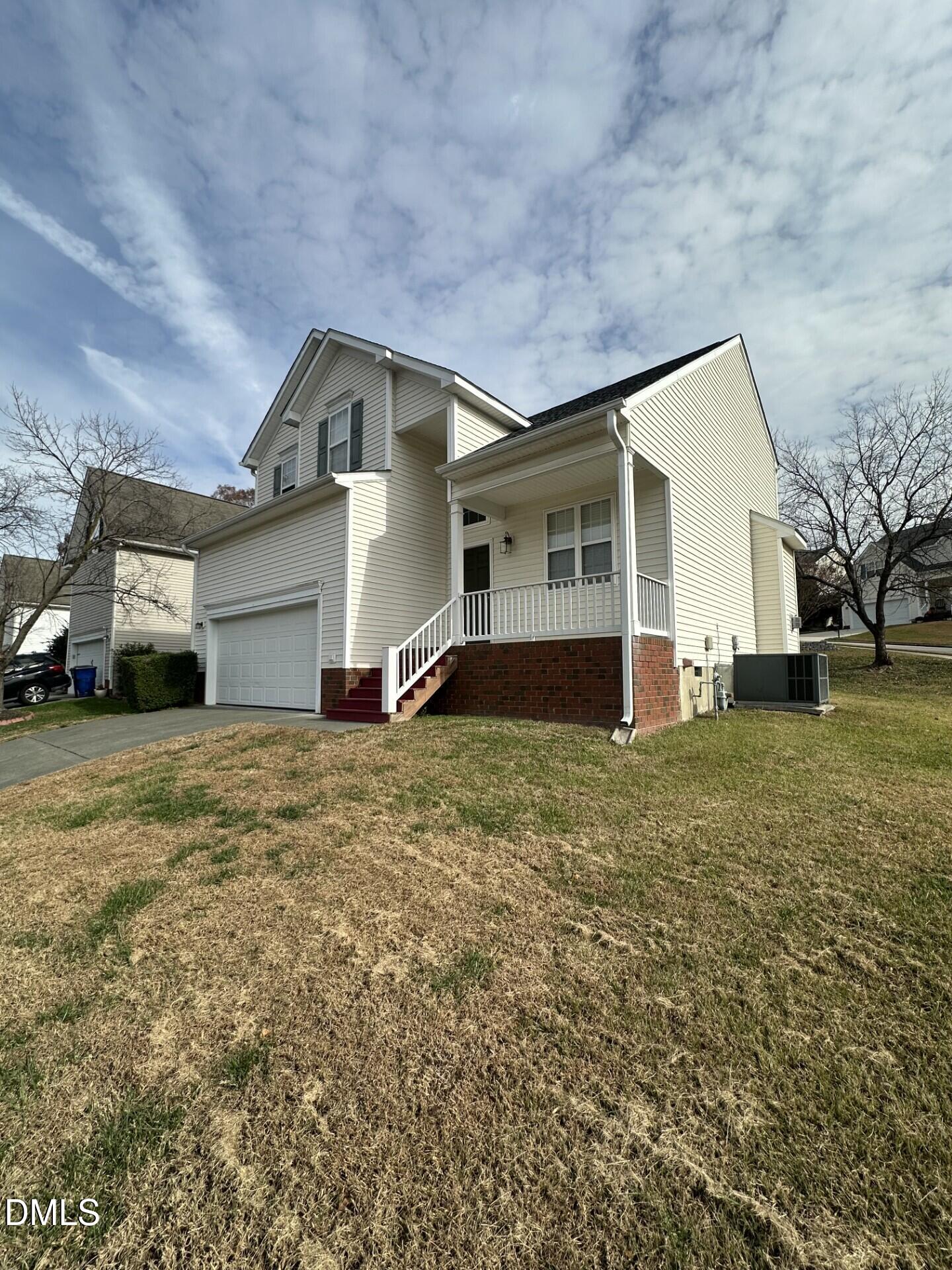 2241 Spruce Shadows Lane Raleigh, NC 27614 - Photo 2 of 18 a house view with a backyard space