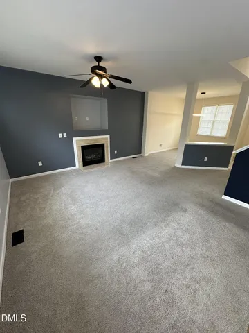 a view of a livingroom with a fireplace
