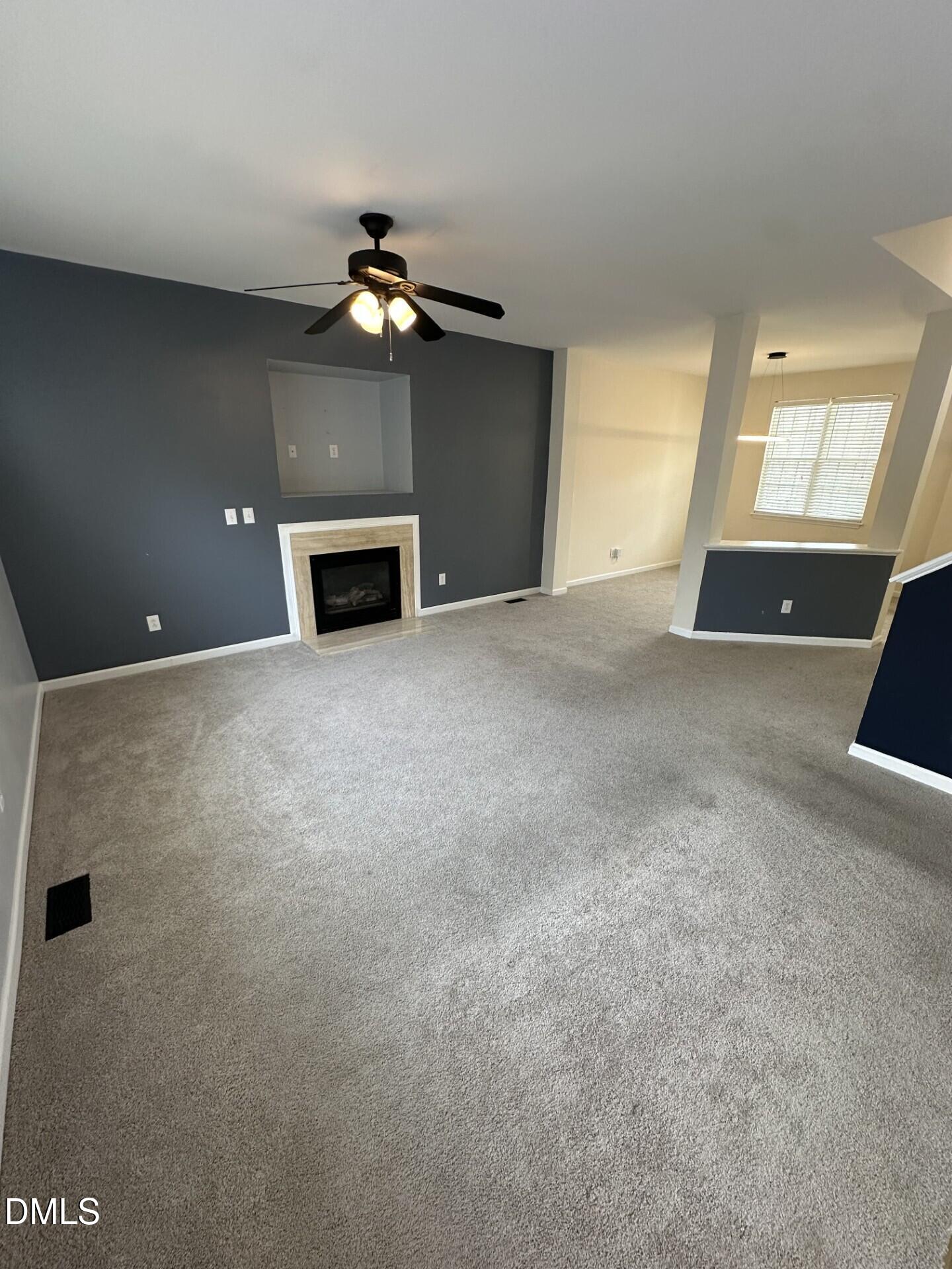 2241 Spruce Shadows Lane Raleigh, NC 27614 - Photo 3 of 18 a view of a livingroom with a fireplace