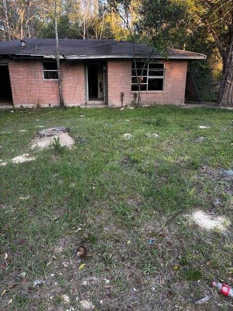 a backyard of a house with lots of green space