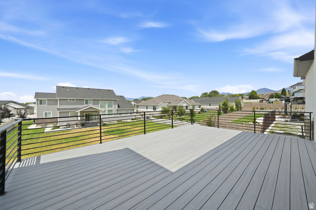 1002 West Temple Rim Lane Payson, UT 84651 - Photo 63 of 68 Spacious elevated deck featuring composite decking and sleek horizontal metal railings