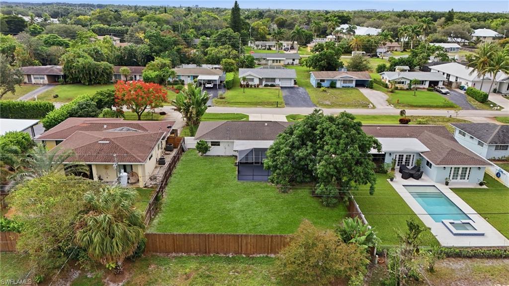 1205 Hilltop Drive Naples, FL 34103 - Photo 15 of 15 an aerial view of multiple houses with yard
