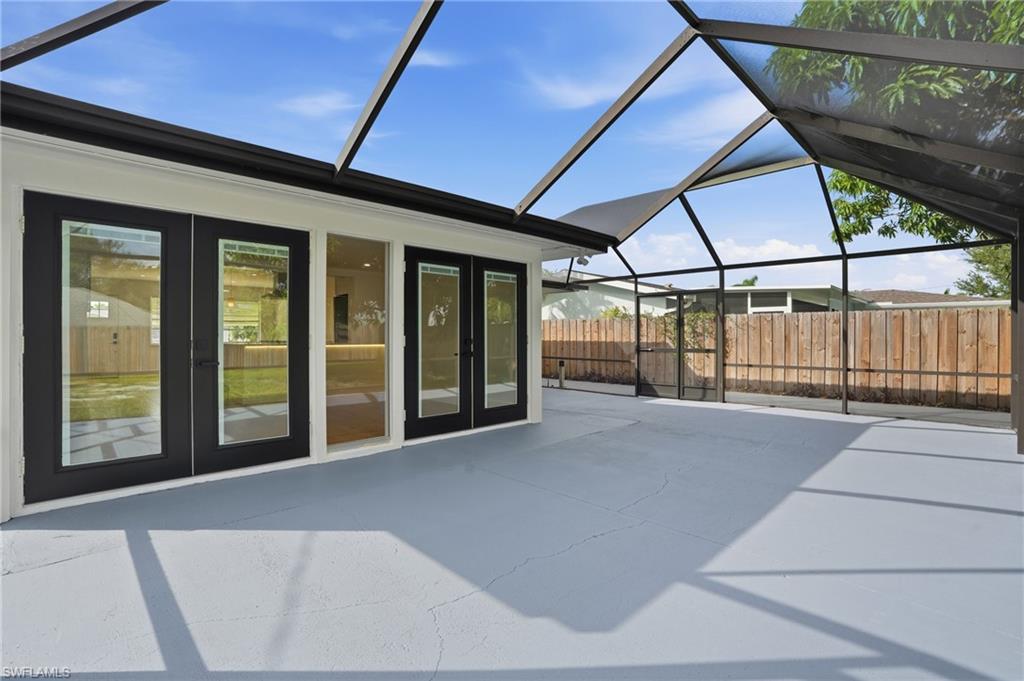 1205 Hilltop Drive Naples, FL 34103 - Photo 6 of 15 a view of an empty room with a balcony