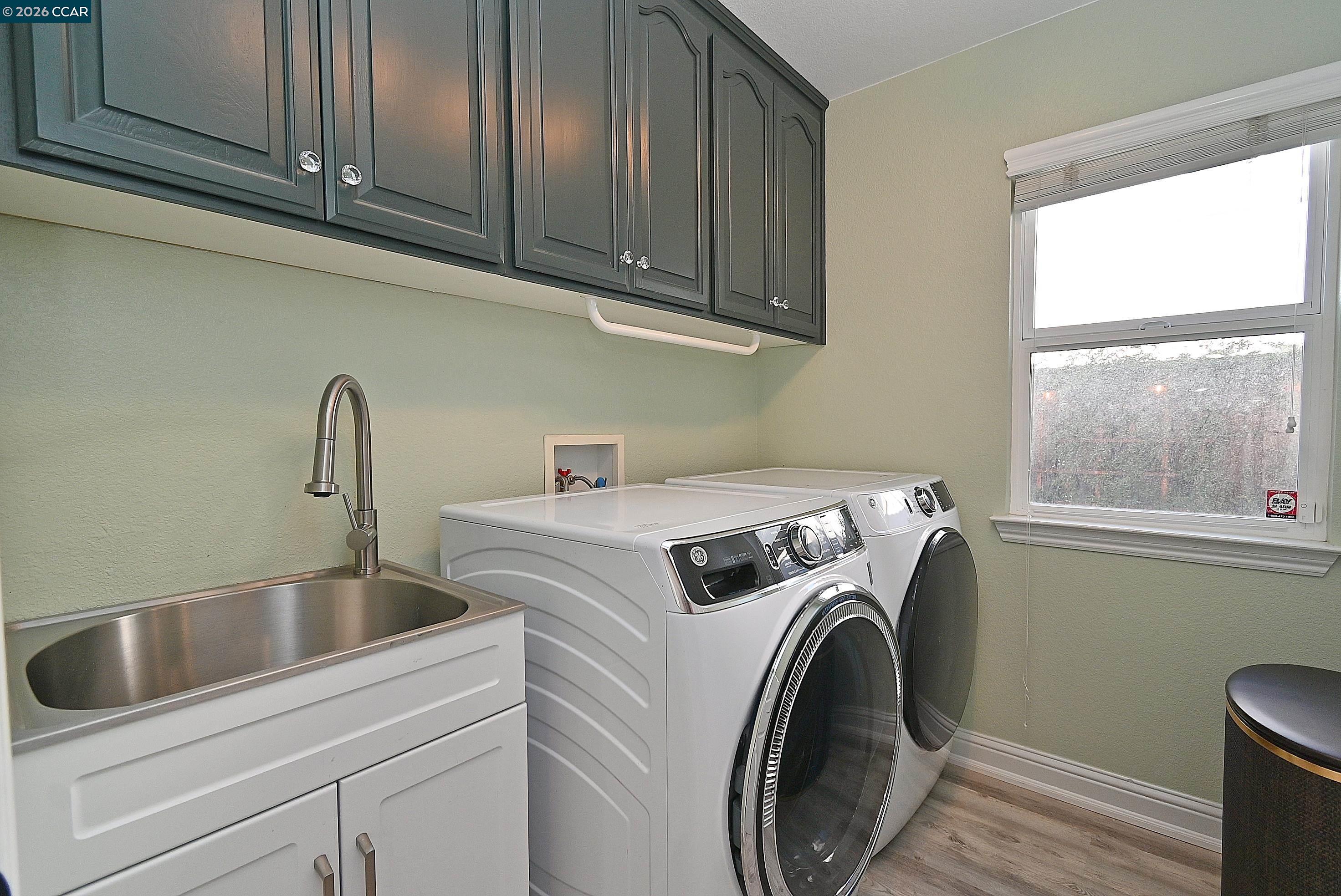 829 Deer Spring Circle Concord, CA 94521 - Photo 18 of 50 a utility room with dryer and washer