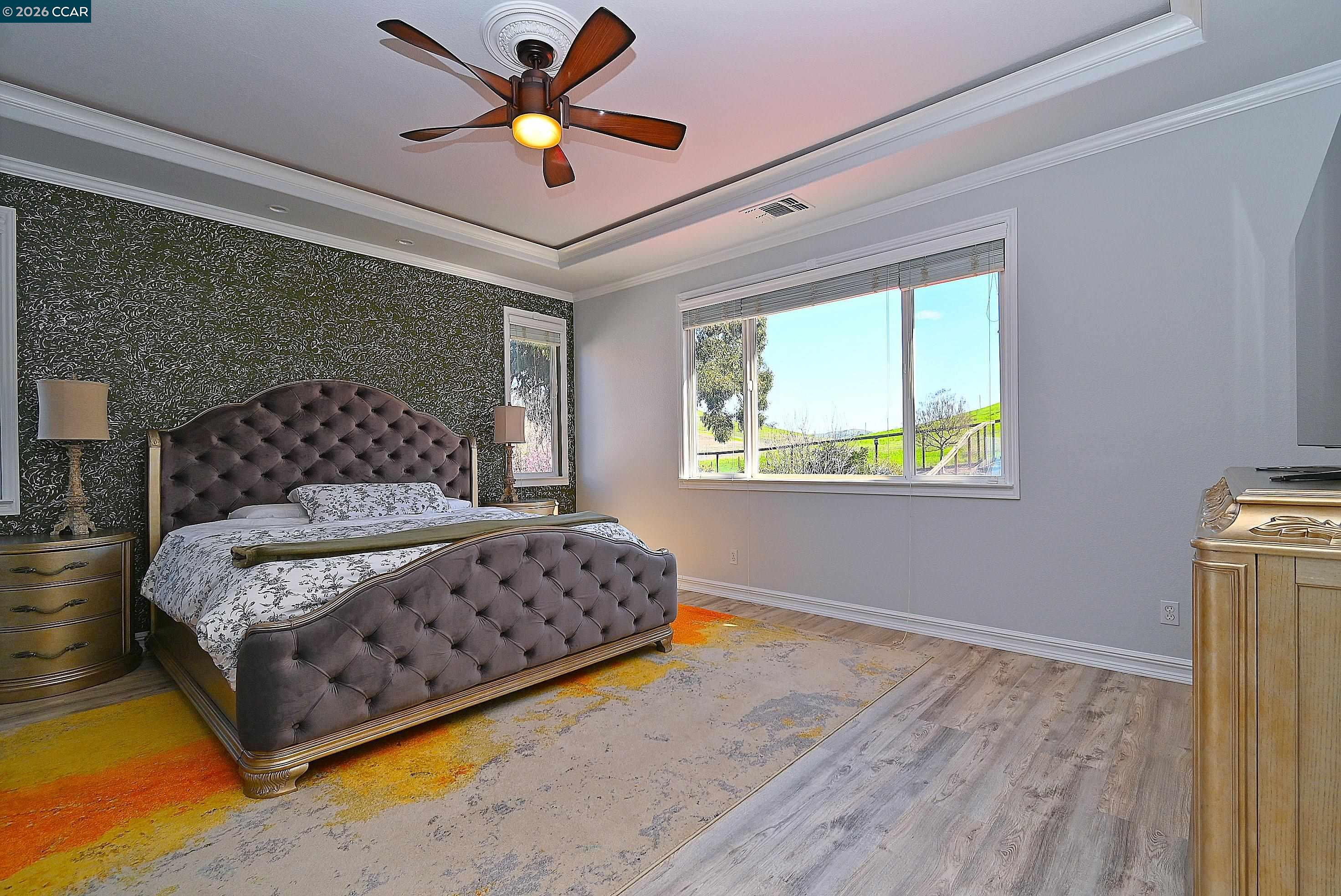 829 Deer Spring Circle Concord, CA 94521 - Photo 20 of 50 a bedroom with a bed dresser and a window