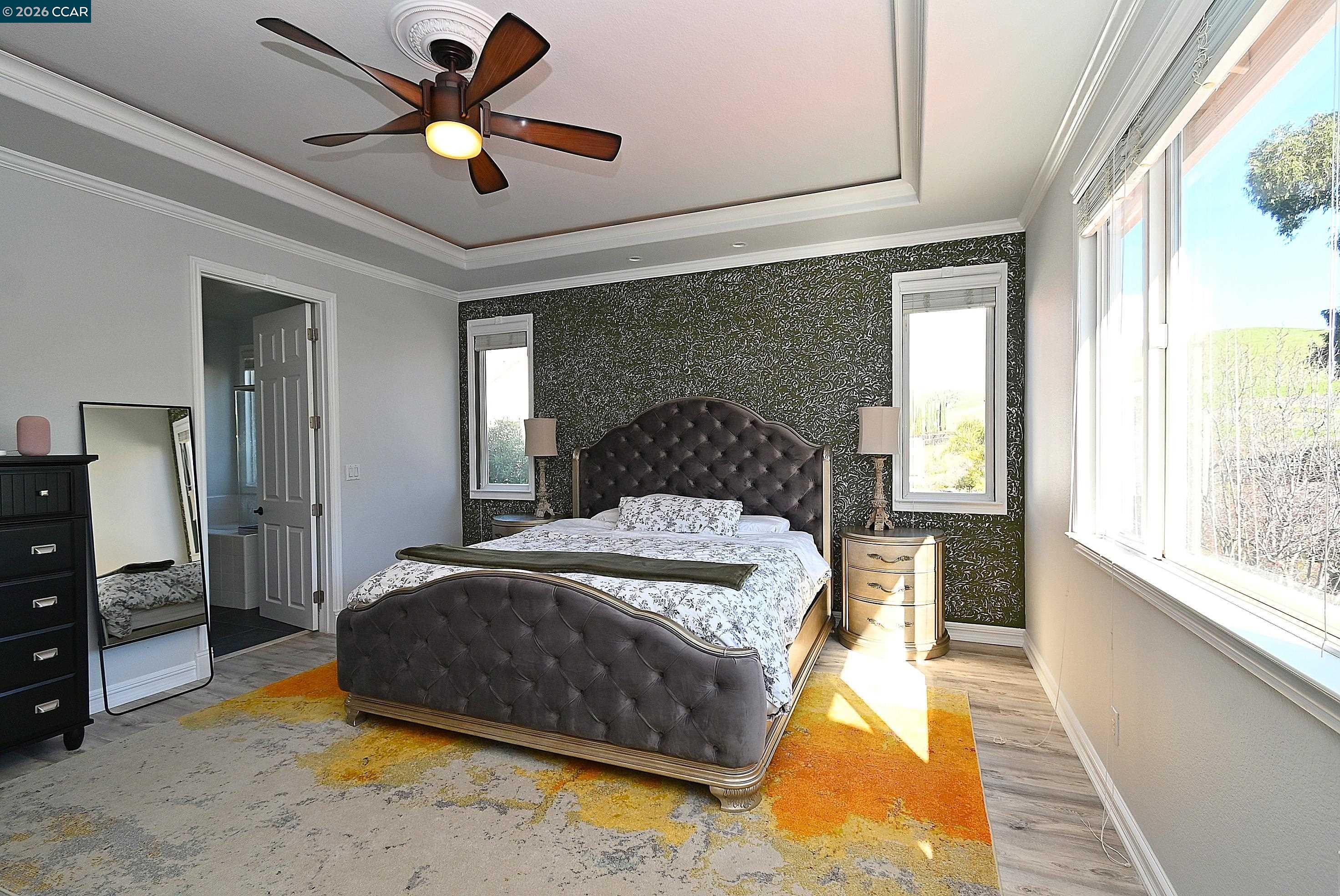 829 Deer Spring Circle Concord, CA 94521 - Photo 21 of 50 a bedroom with a large bed and a large window
