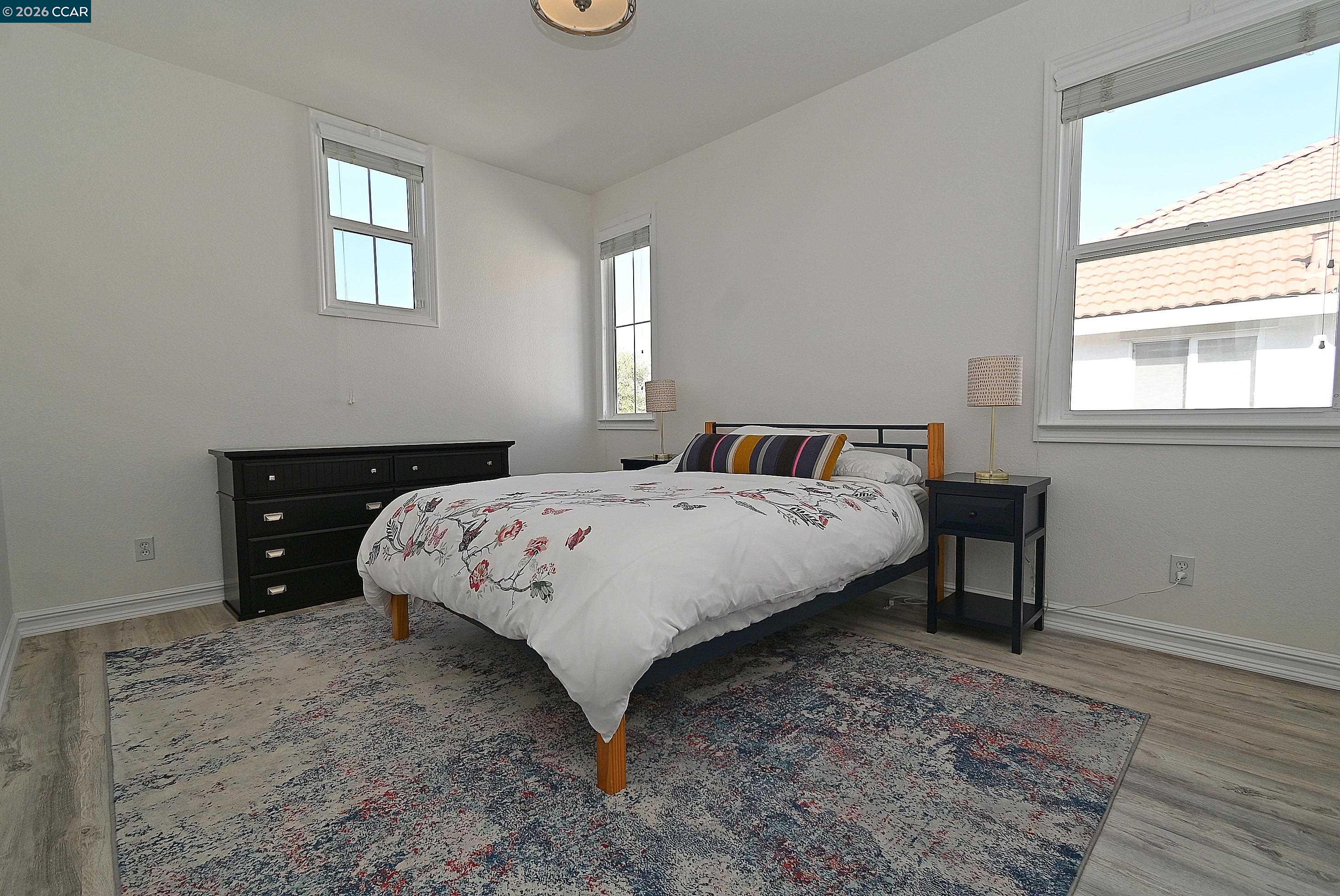 829 Deer Spring Circle Concord, CA 94521 - Photo 26 of 50 a bedroom with a bed and a window