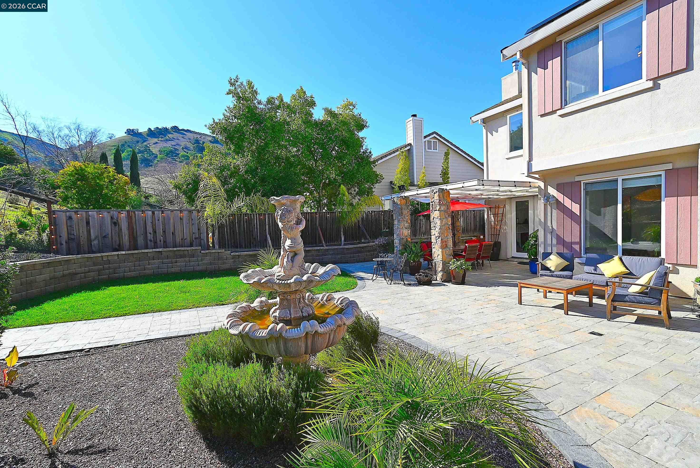 829 Deer Spring Circle Concord, CA 94521 - Photo 33 of 50 a view of a chair and tables in the backyard