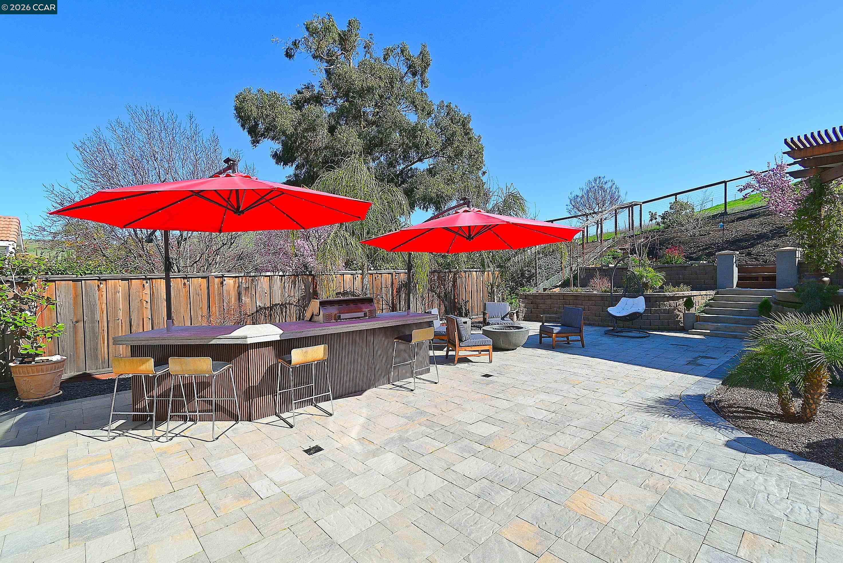 829 Deer Spring Circle Concord, CA 94521 - Photo 34 of 50 an outdoor space with patio lots of furniture and umbrella