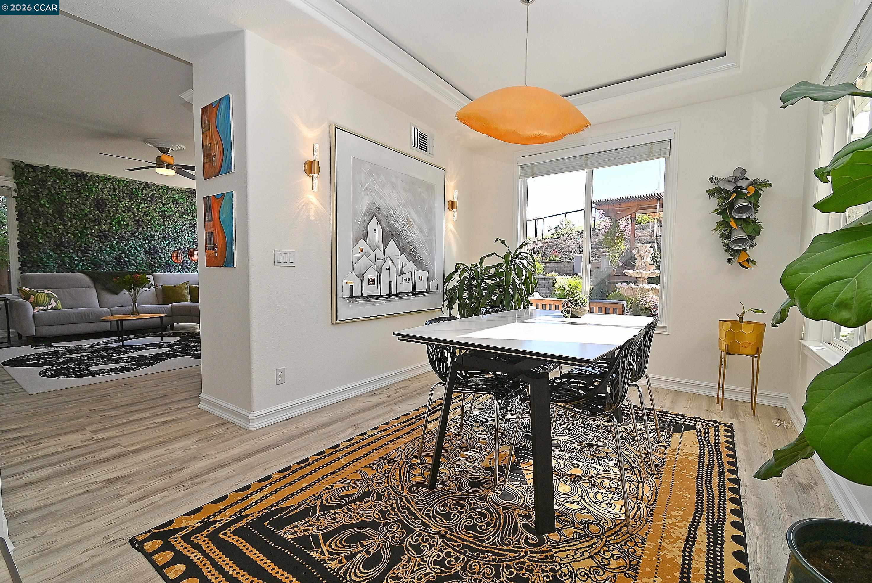 829 Deer Spring Circle Concord, CA 94521 - Photo 7 of 50 a view of a dining room with furniture window and wooden floor