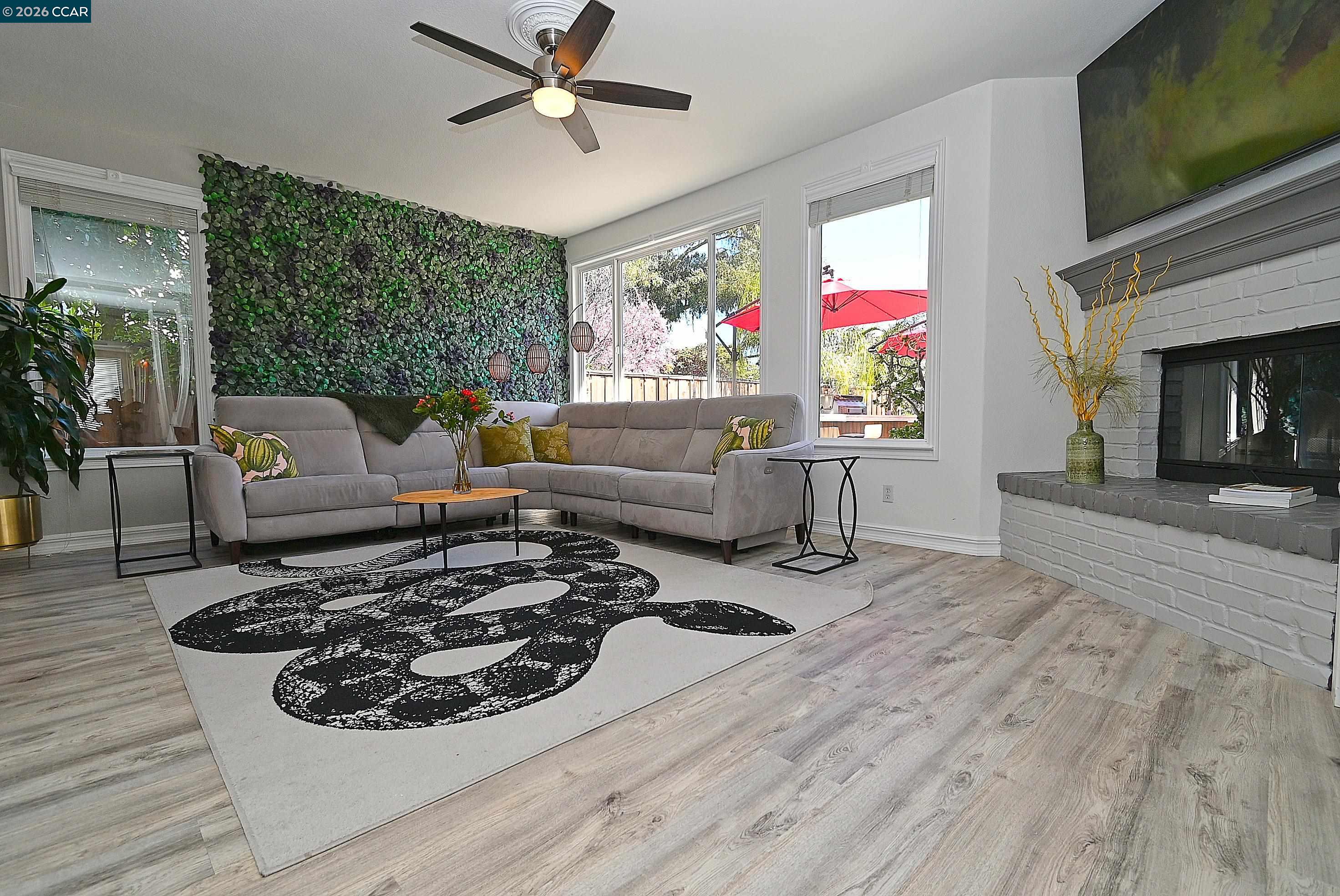 829 Deer Spring Circle Concord, CA 94521 - Photo 9 of 50 a living room with furniture and a fireplace