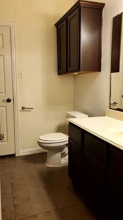 a bathroom with a sink and a toilet