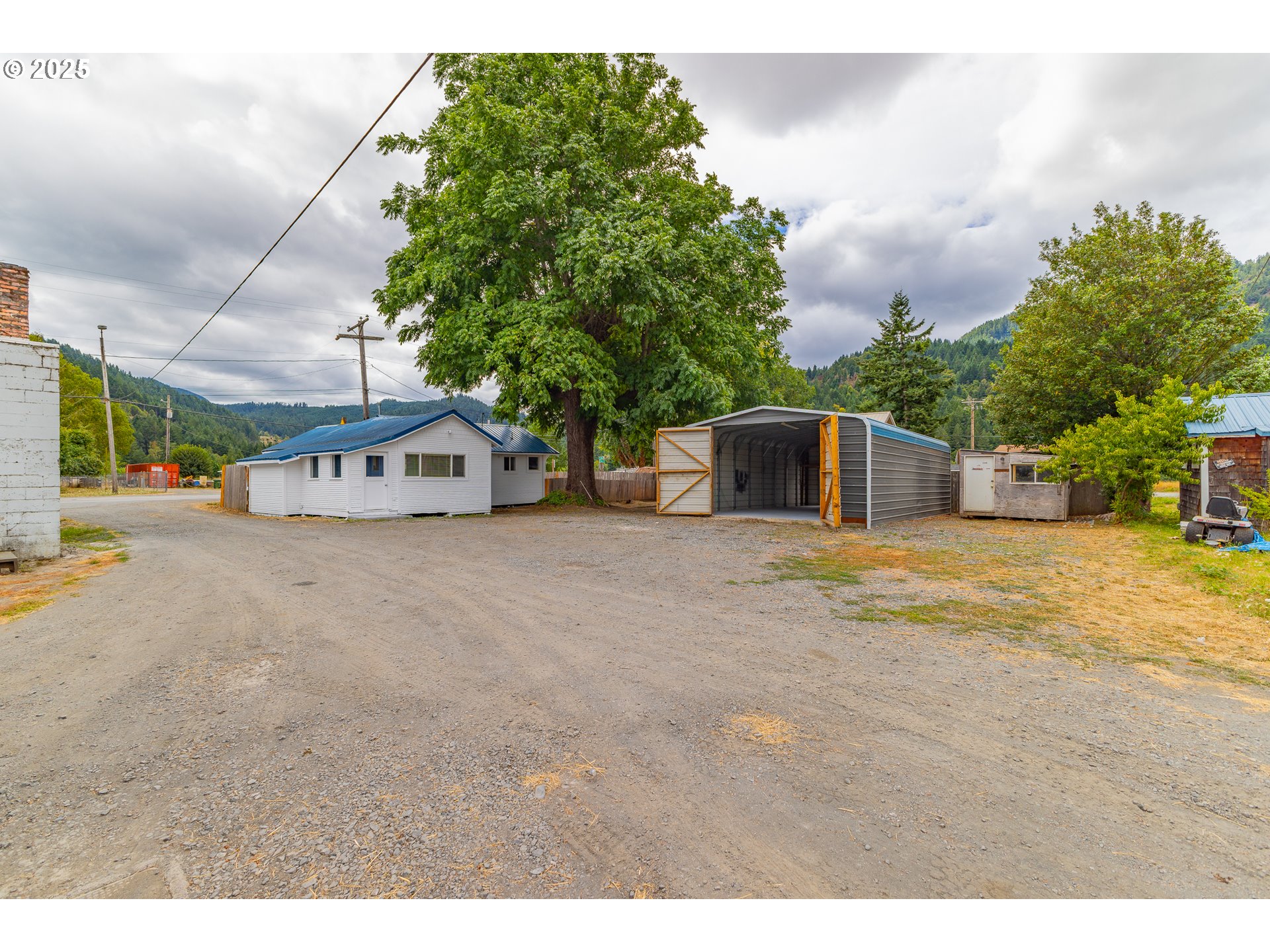 141 Poplar Street Powers, OR 97466 - Photo 14 of 37 a house view with a outdoor space