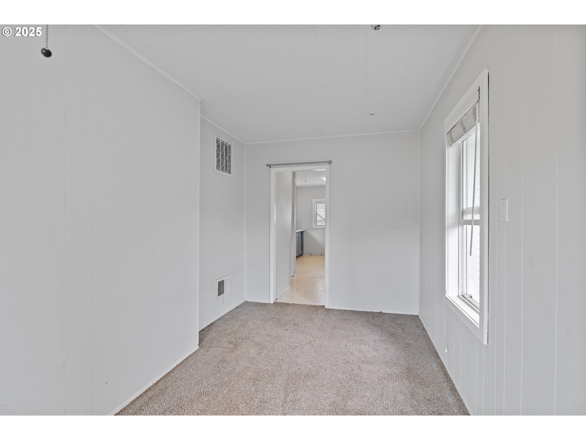141 Poplar Street Powers, OR 97466 - Photo 15 of 37 a view of an empty room with a window