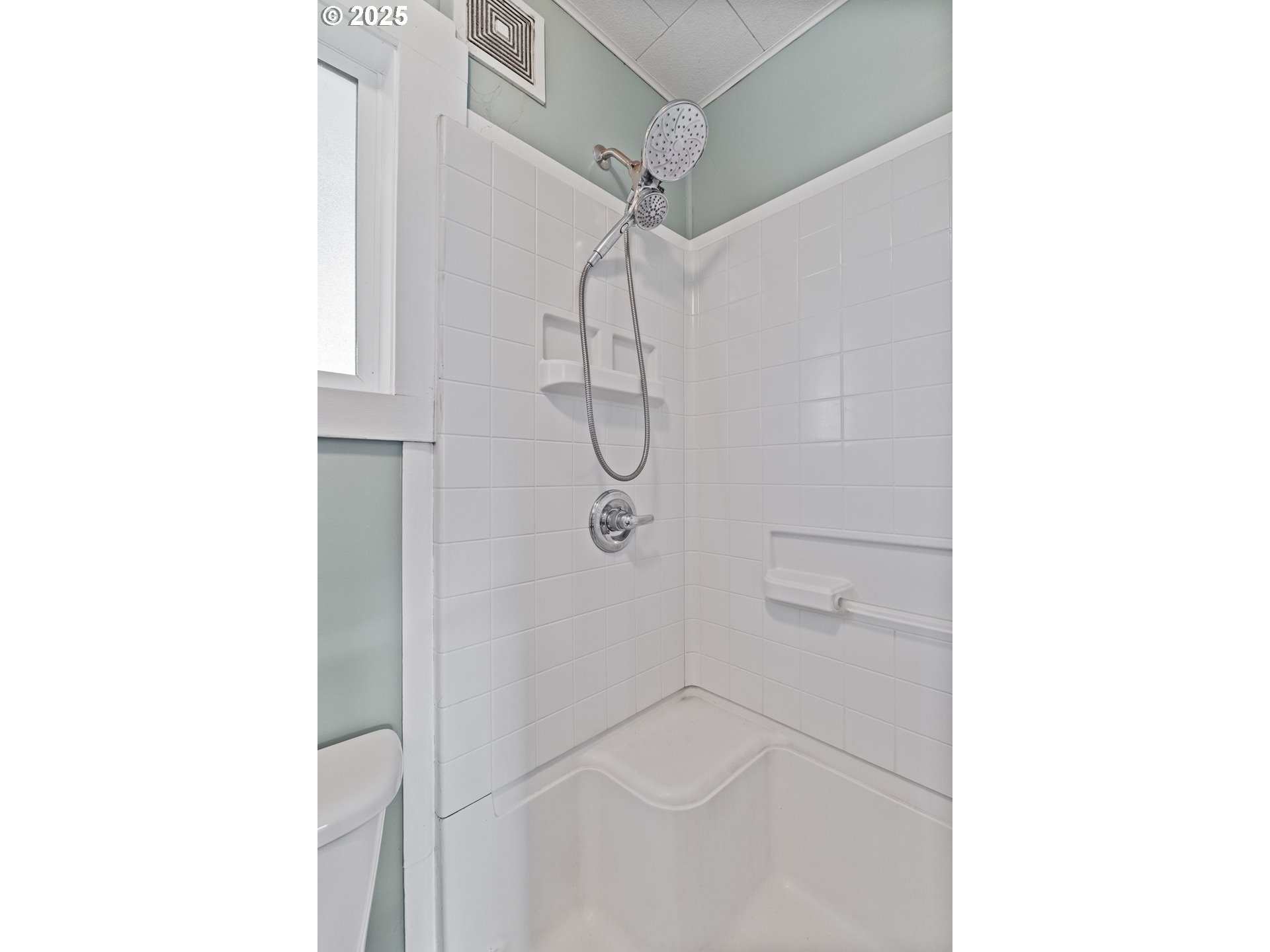 141 Poplar Street Powers, OR 97466 - Photo 20 of 37 a bathroom with a glass shower door