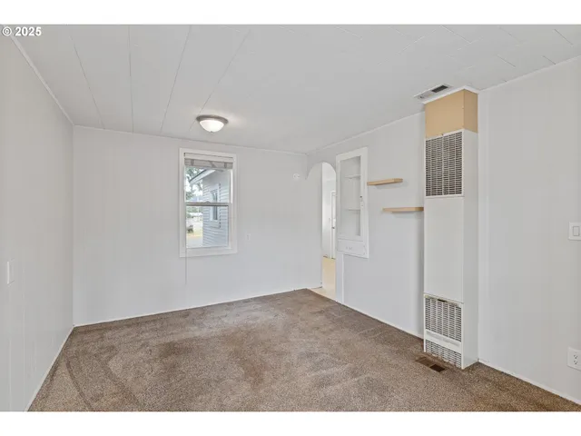 a view of an empty room with window