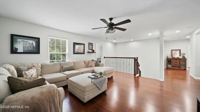 a spacious bathroom with a granite countertop sink mirror and