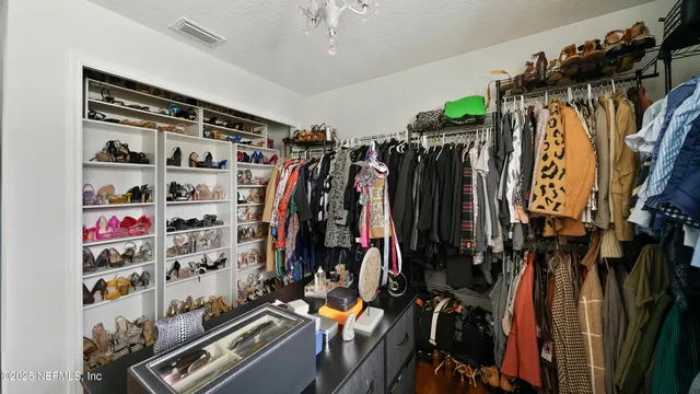 a view of a house with swimming pool and porch