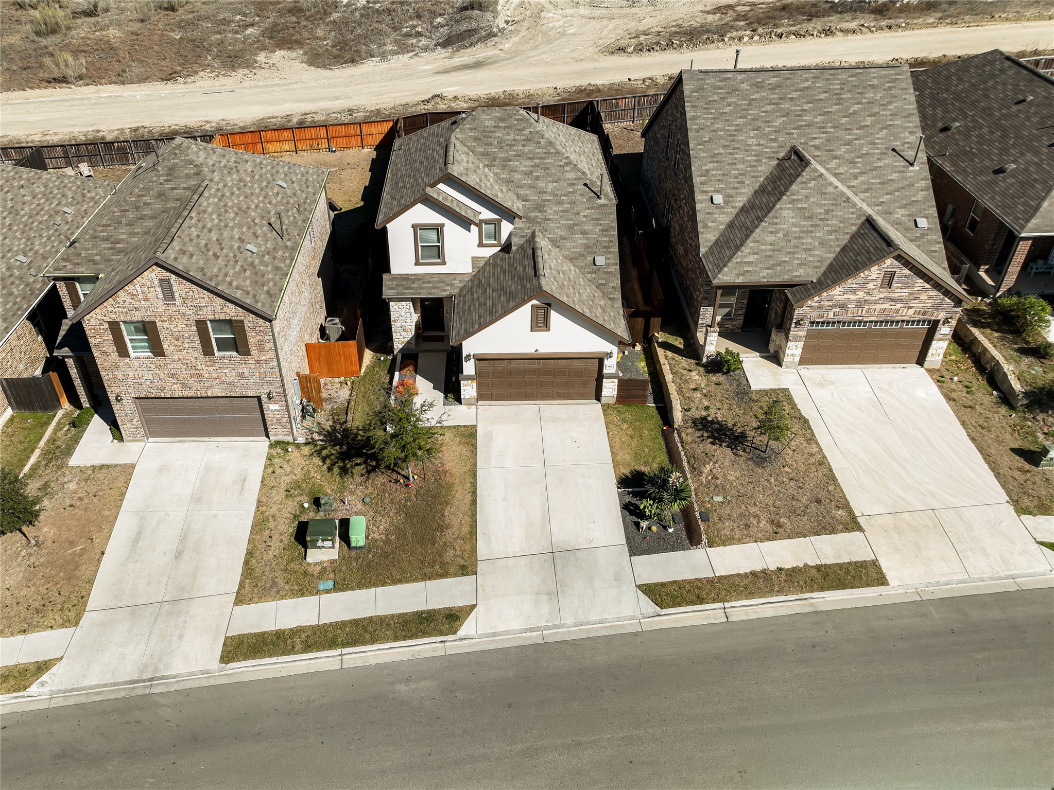 862 Pepperbark Loop Buda, TX 78610 - Photo 40 of 40 an aerial view of a house with a outdoor space
