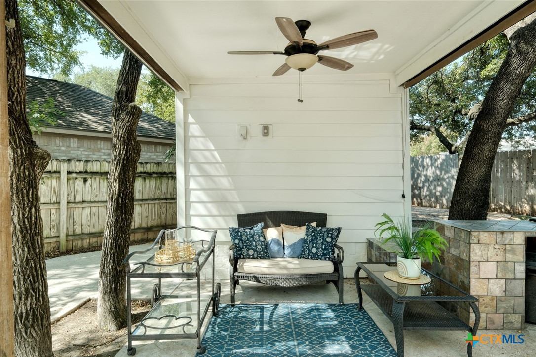 3403 Northwest Boulevard Georgetown, TX 78628 - Photo 21 of 28 a living room with furniture and a fireplace
