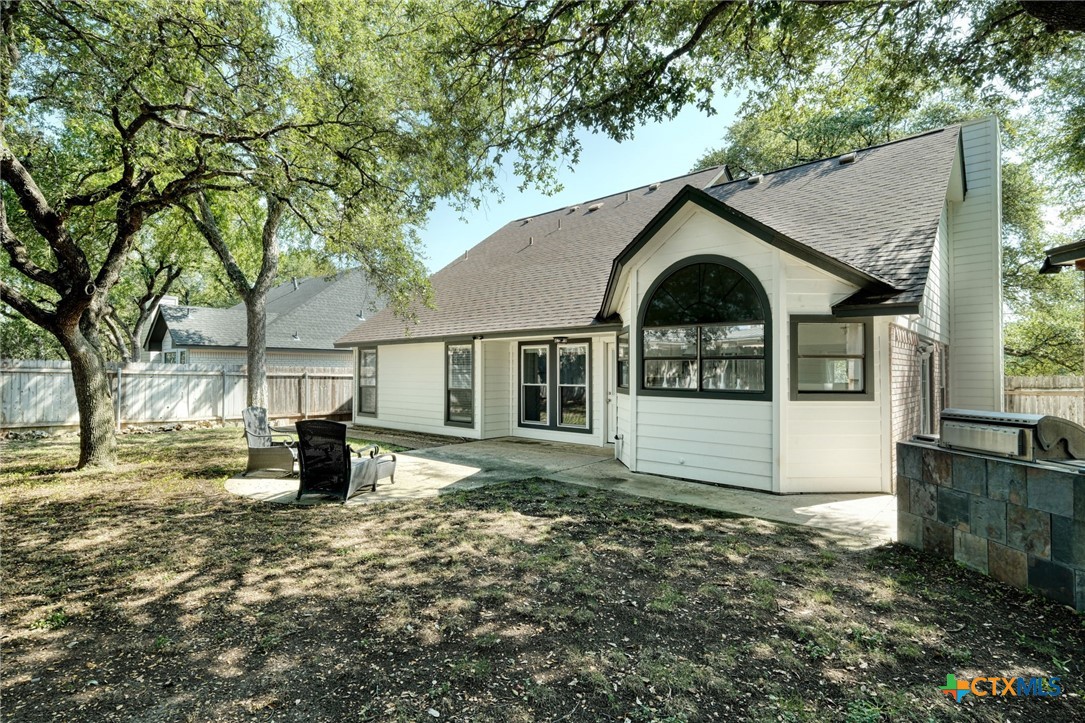 3403 Northwest Boulevard Georgetown, TX 78628 - Photo 24 of 28 a front view of a house with a yard