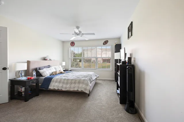 a bedroom with a bed and a walk in closet