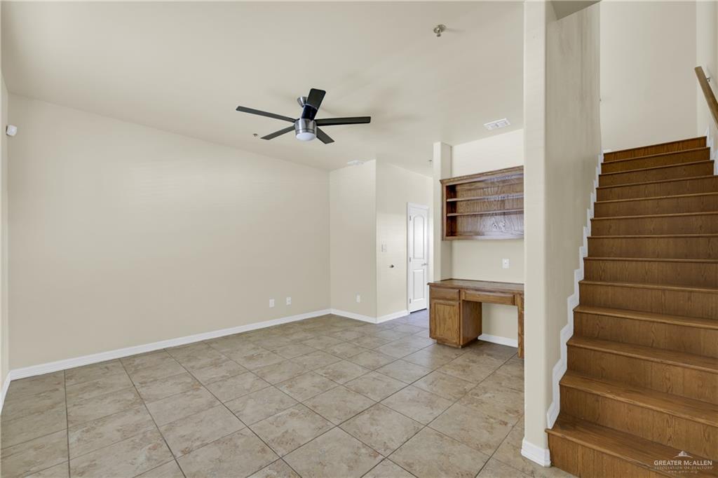1814 East Iowa Road Edinburg, TX 78542 - Photo 11 of 22 a view of empty room with wooden floor