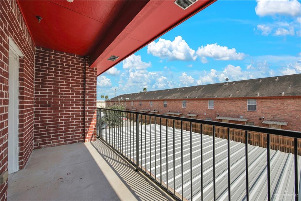 1814 East Iowa Road Edinburg, TX 78542 - Photo 17 of 22 a view of balcony with wooden floor