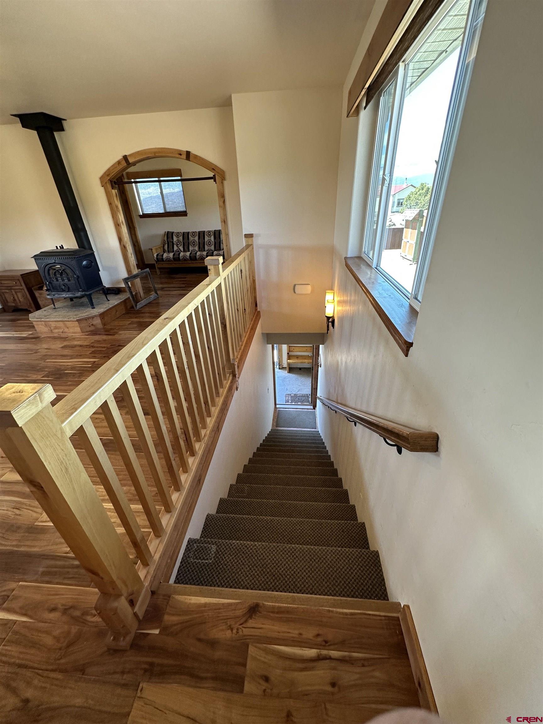 18180 Hanson Road Cedaredge, CO 81413 - Photo 3 of 34 a view of entryway and hall with wooden floor