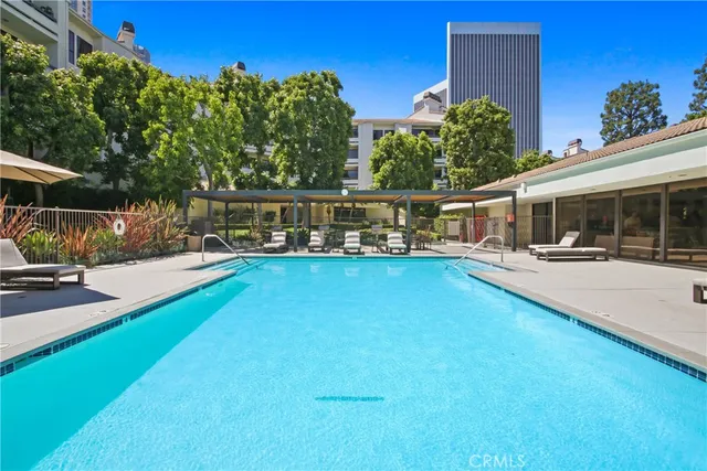 a view of a house with swimming pool