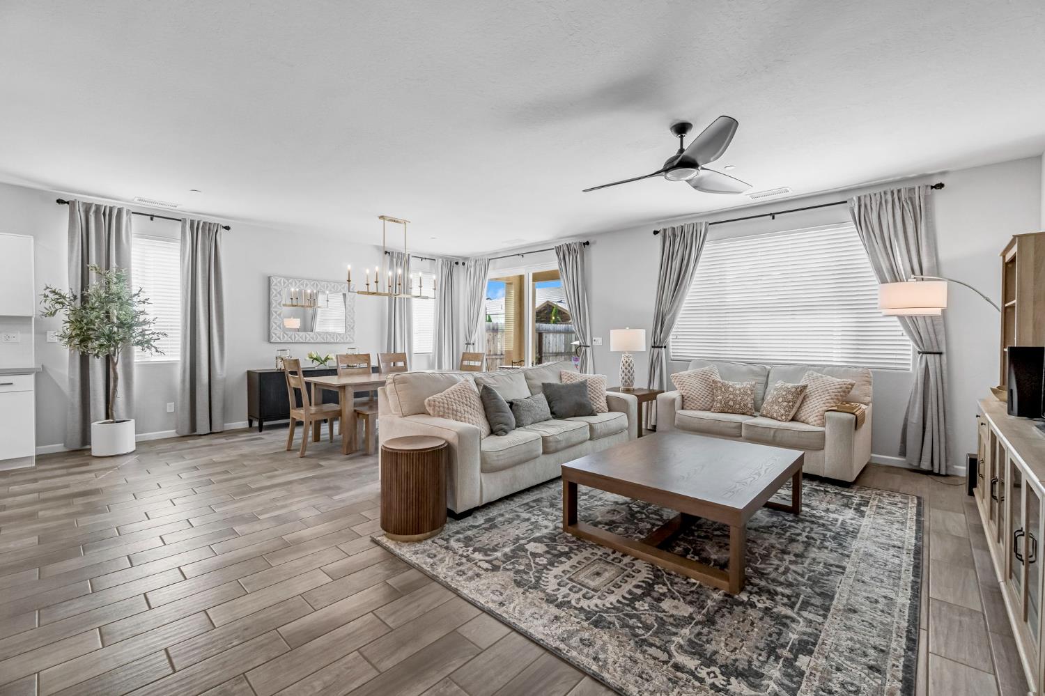 968 Pinnacle Drive Madera, CA 93636 - Photo 12 of 39 a living room with furniture and wooden floor