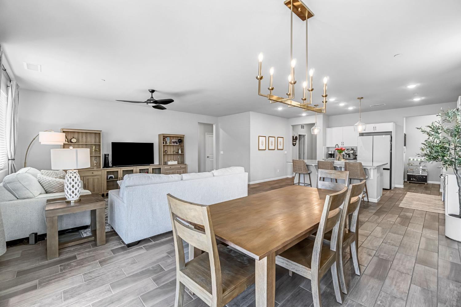 968 Pinnacle Drive Madera, CA 93636 - Photo 16 of 39 a view of a dining room with furniture and a livingroom