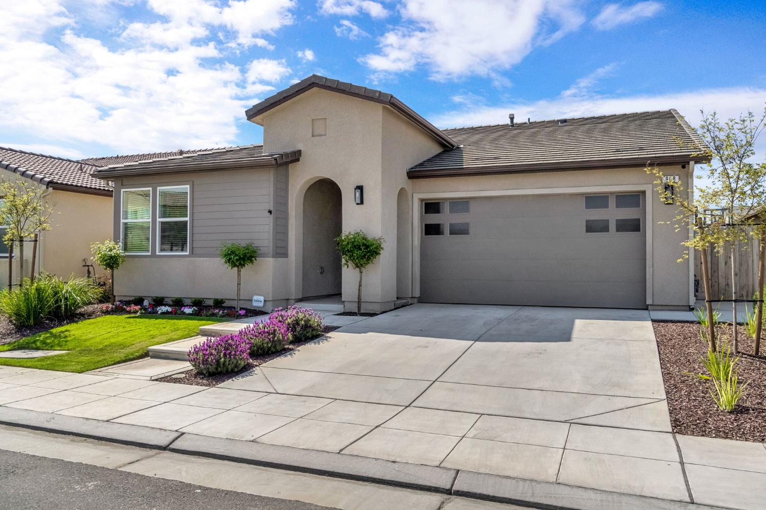 968 Pinnacle Drive Madera, CA 93636 - Photo 2 of 39 a front view of house with an outdoor space