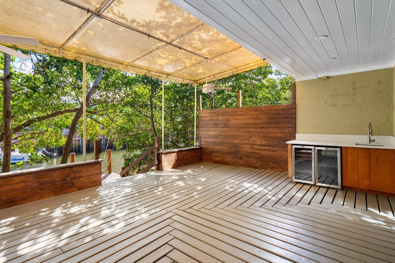 720 Mariners Way Boynton Beach, FL 33435 - Photo 14 of 49 a view of a backyard with sitting area