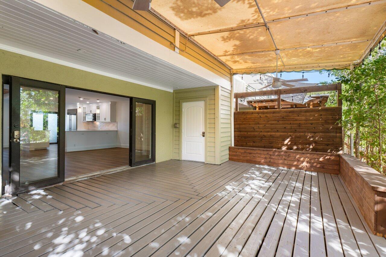 720 Mariners Way Boynton Beach, FL 33435 - Photo 15 of 49 a view of outdoor space with wooden floor and door
