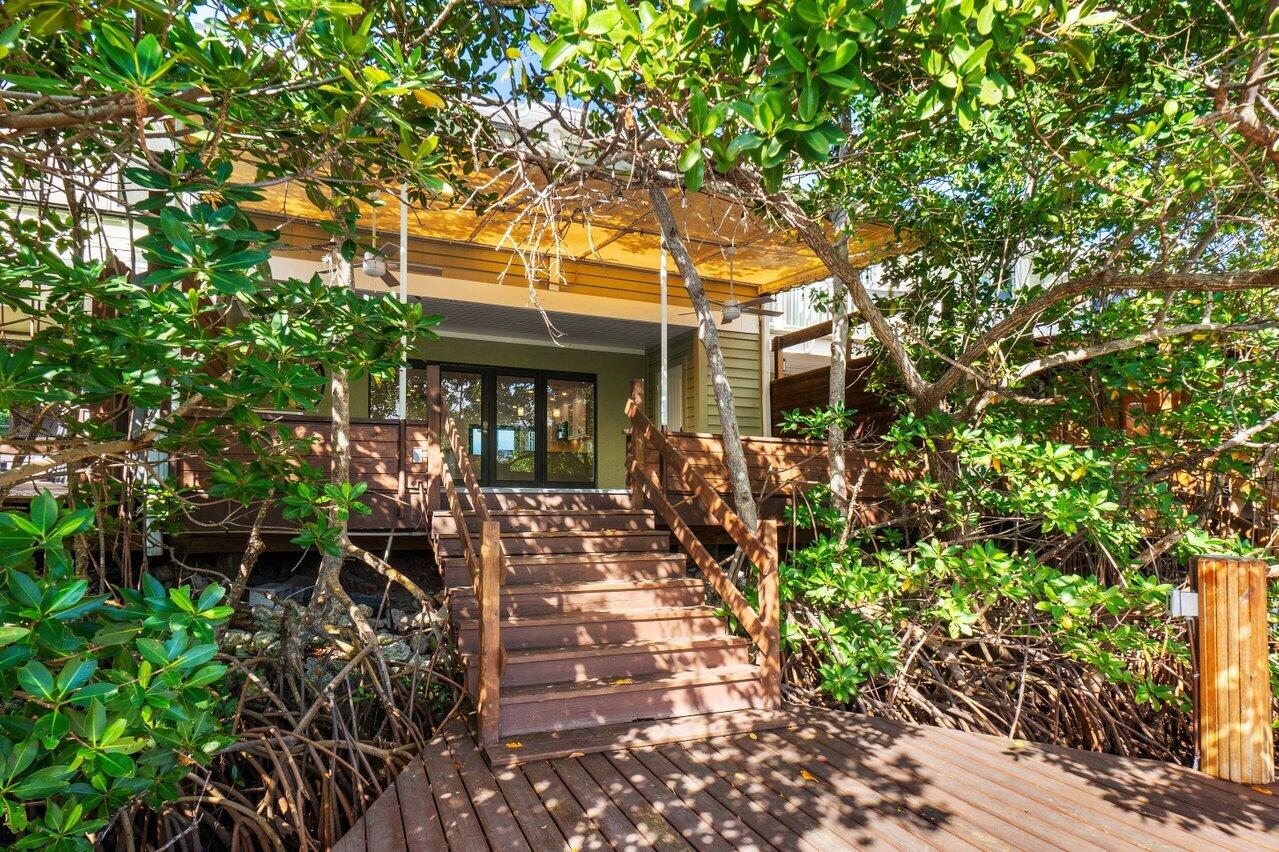 720 Mariners Way Boynton Beach, FL 33435 - Photo 18 of 49 a front view of a house with a yard