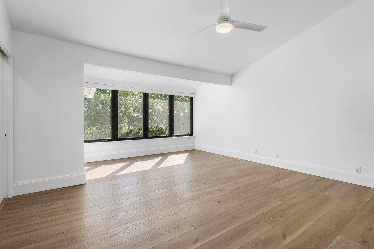 720 Mariners Way Boynton Beach, FL 33435 - Photo 23 of 49 wooden floor in an empty room with a window