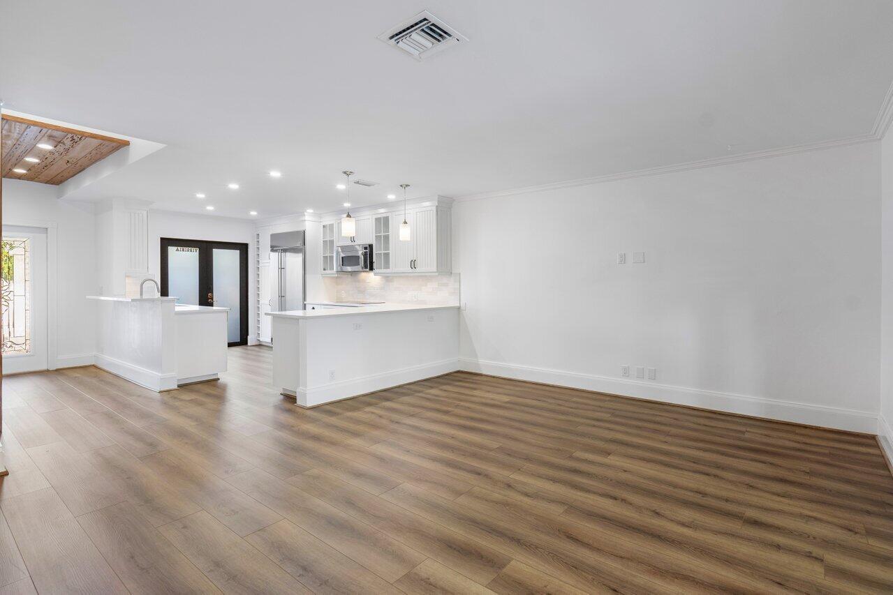 720 Mariners Way Boynton Beach, FL 33435 - Photo 10 of 49 a view of a kitchen with wooden floor and a kitchen