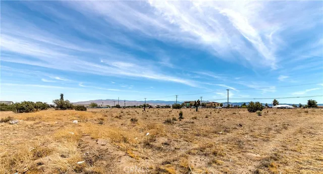 a view of snow on the road