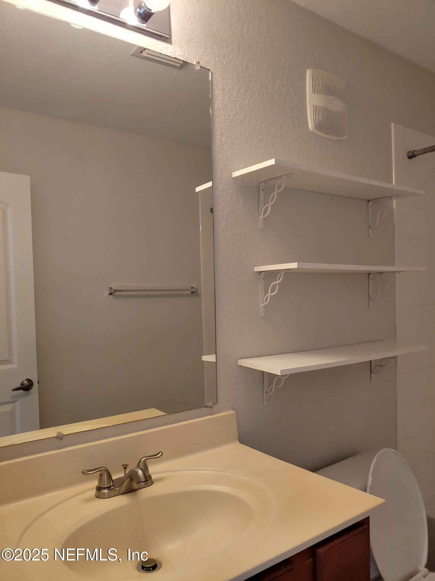 10200 Belle Rive Boulevard, Unit 3605 Jacksonville, FL 32256 - Photo 28 of 34 Hallway bathroom view