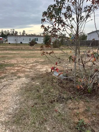 a view of a yard with an outdoor space