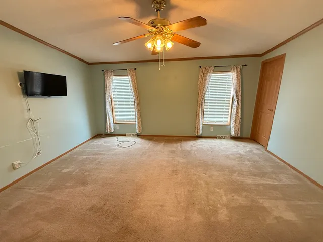 a view of a livingroom with a flat screen tv