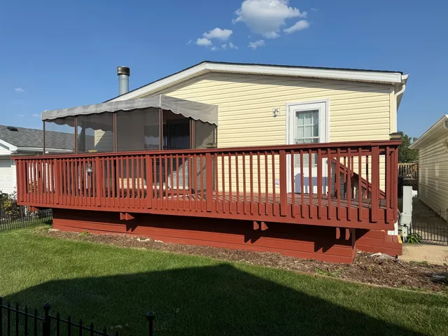 a view of a backyard with a deck