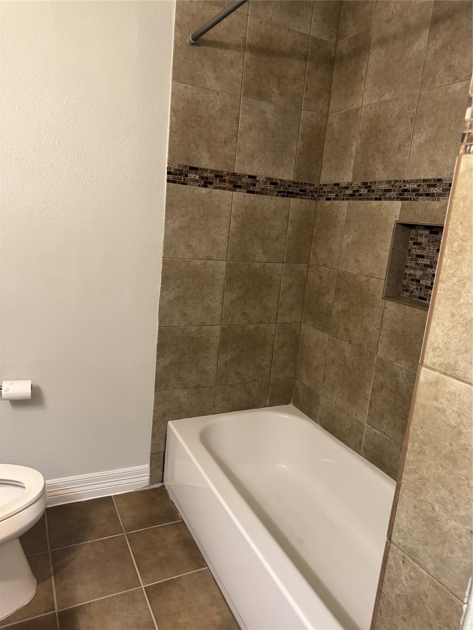 534 Sulphur Street Houston, TX 77034 - Photo 11 of 46 a bathroom with a granite countertop bathtub and a toilet