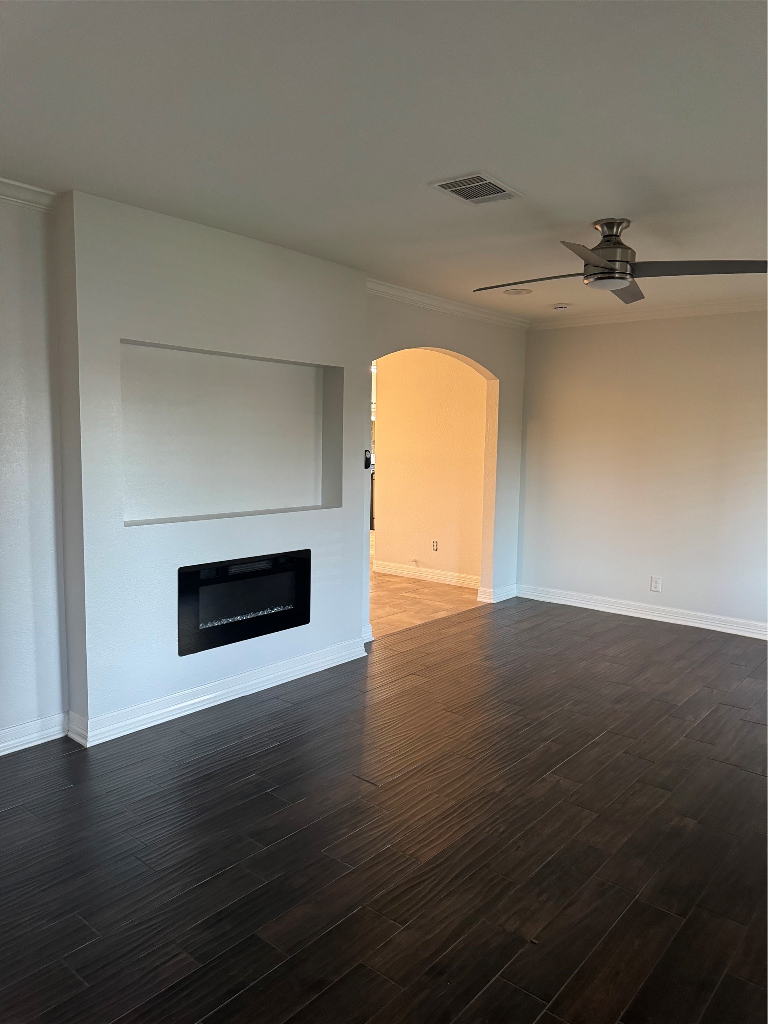 534 Sulphur Street Houston, TX 77034 - Photo 18 of 46 a view of empty room with wooden floor and fireplace